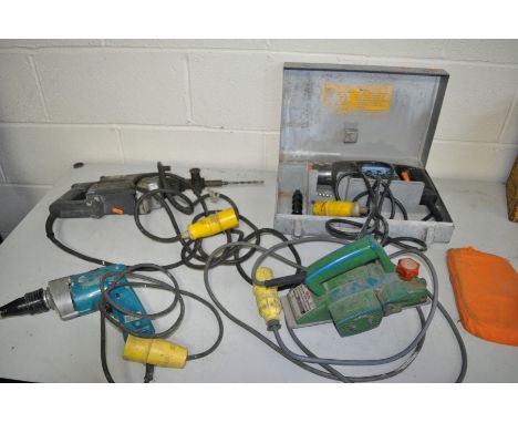A WOLF 8614 ELECTRIC PLANER, an AEG SDS drill in case, a Skil SDS drill and a Black and Decker Drywall driver (not working) a