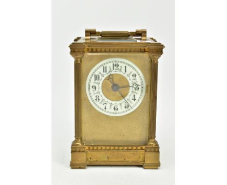A BRASS CASED GLASS SIDED CARRIAGE CLOCK, fancy enamel chapter ring with hour, minute and seconds sweep hands, with fluted co