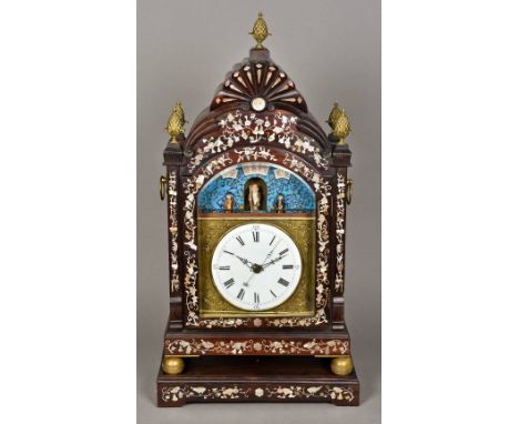 A Chinese mother-of-pearl inlaid hardwood cased automaton table clockThe 8 1/2 inch white painted dial with Roman numerals wi