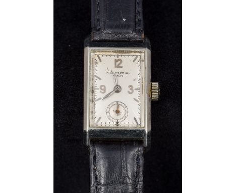 An 18 ct white gold cased Patek Philippe wristwatchThe rectangular silvered dial with Arabic numerals and batons and subsidia