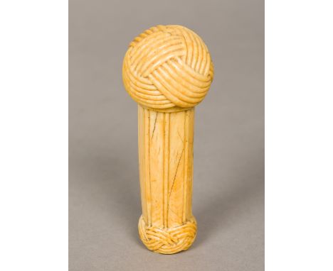 A 19th century carved marine ivory sailor's knot walking stick handleOf typical knotted form.  9.5 cm high.    CONDITION REPO