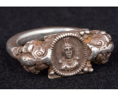 A silver seal ring, possible 2nd century BC HellenisticThe central bezel worked with a portrait, probably depicting Alexander