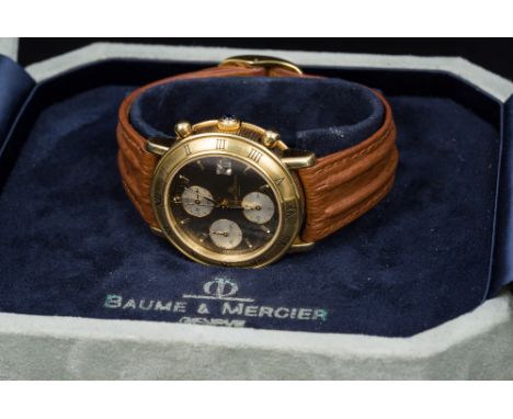 A Baume & Mercier 18 ct gold cased baumatic chronograph wristwatchThe signed 1 1/8th inch black dial with silvered subsidiary