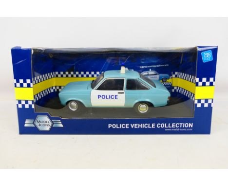 Model Icons - A boxed Limited Edition 1:18 scale Model Icons #999002 Ford Escort Mk2 1.1 Popular Hampshire Police Car. The mo