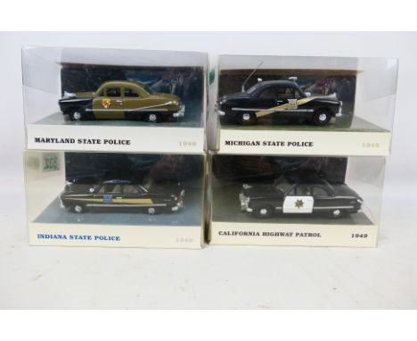 White Rose Collectibles - Four boxed 1:43 scale diecast Police vehicles from White Rose Collectibles. Lot consists of Indiana