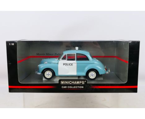 Minichamps - A boxed 1:18 scale Minichamps #150137090 Morris Minor Police Car. The model shows very dusty signs of display, a