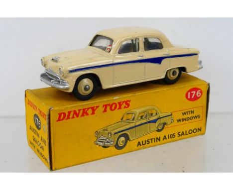 Dinky Toys - A boxed Dinky Toys #176 Austin A105 Saloon. The model with cream body and violet blue panel line, silver trim an