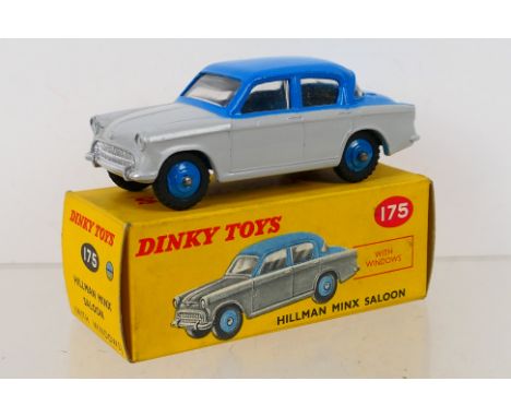 Dinky Toys - A boxed Dinky Toys #175 Hillman Minx Saloon. The model with grey lower body, mid blue roof and boot, with blue r
