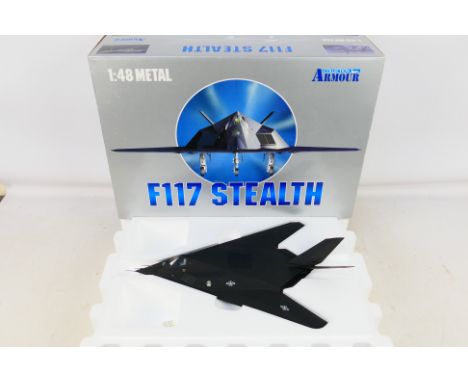 Armour - A boxed #98062 1/48 scale F117 Stealth U.S. Air Force. Item appears to be in excellent condition. Heald within its p
