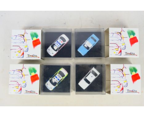 Trofeu - Four boxed diecast 1:43 scale model Police vehicles from Trofeu. Lot consists of Trofeu #626 Subaru Impreza WRX Nort