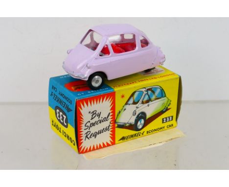 Corgi Toys - A boxed Corgi Toys #223 Heinkel Trojan Economy Car. The model with lilac body, flat spun hubs, with red interior