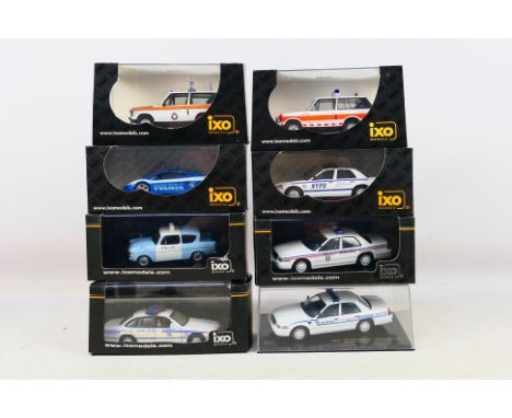 IXO - Eight boxed diecast 1:43 scale model Police vehicles from IXO. Lot includes CLC042  Range Rover Greater Manchester Poli