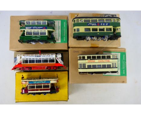 Unmarked Makers - A collection of four built white metal plus one plastic 1:76 scale model trams. The trams appear to be buil