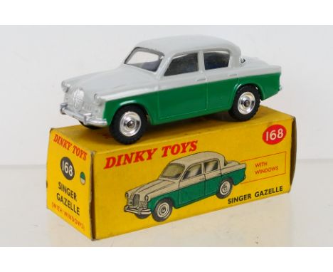Dinky Toys - A boxed Dinky Toys #168 Singer Gazelle. The model with dark green lower body, grey upper body, spun hubs, silver