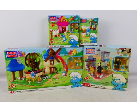 Mega Bloks - A collection 4 Smurf themed Mega Bloks sets. Items appear to be in very good condition. Housed in good plus boxe