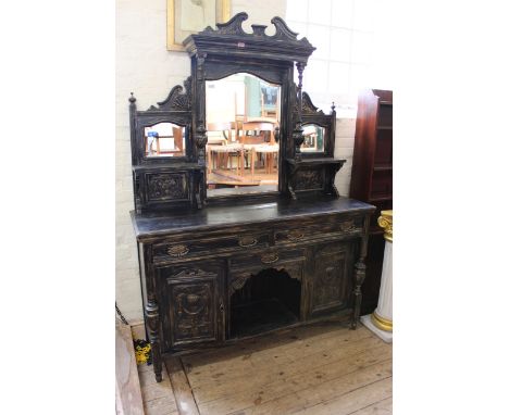 An ebonised Edwardian mirror back sideboard with gilt decoration