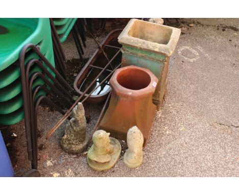 A metal trough and metal rods together with a terracotta plinth and garden gnomes etc