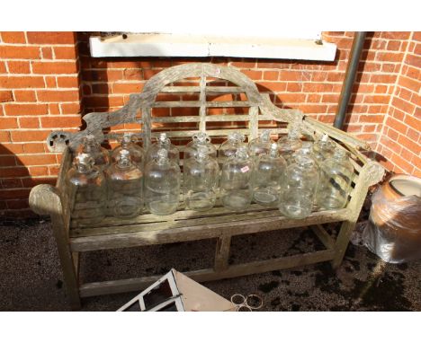 A teak Oriental style garden bench 