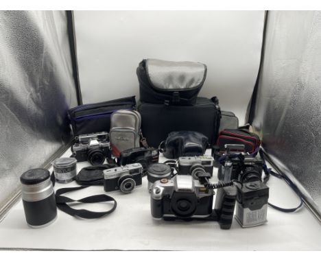 Collection of Vintage Cameras to include Olympus, Minolta, Samsung, Maxim, along with Camera Lenses. 