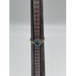 9ct Yellow Gold Diamond Blue Topaz Ring.