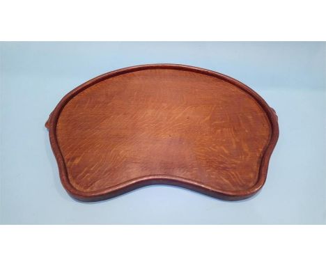 A Robert 'Mouseman' Thompson of Kilburn shaped oak tray, with two carved mice to the sides. 43cm wide