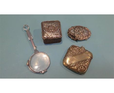 A vesta, lorgnette etc.