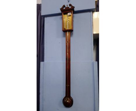 A reproduction mahogany stick barometer, signed Thos Wright