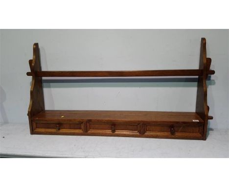 An oak wall shelf, 110cm wide