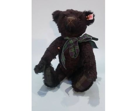 A small Steiff black bear