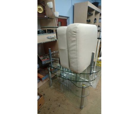 Three modern glass tables, a leather pouffe and a lamp