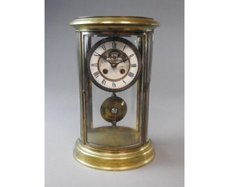 A late 19th-century French oval four-glass mantel clock by S. Marti of Paris, the brass case has opening front and back and i