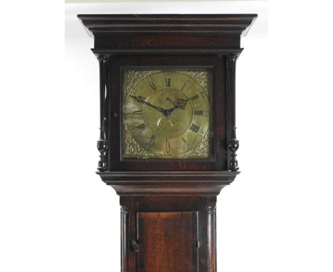 A third quarter of the 18th century oak 30-hour longcase clock by John Roberts of Wrexham, the hood with moulded cornice over