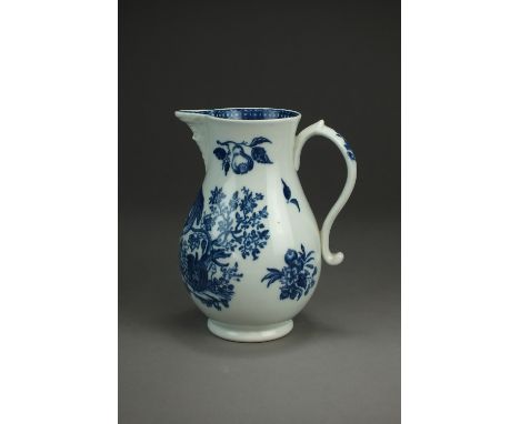 A Caughley mask-head baluster jug, circa 1778-88, transfer-printed in underglaze blue with the Parrot Pecking Fruit pattern, 