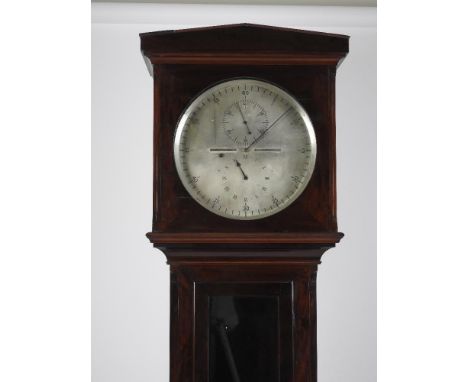 A late 19th-century mahogany longcase regulator by Batty & Sons, Manchester, the architectural case has canted corners to the