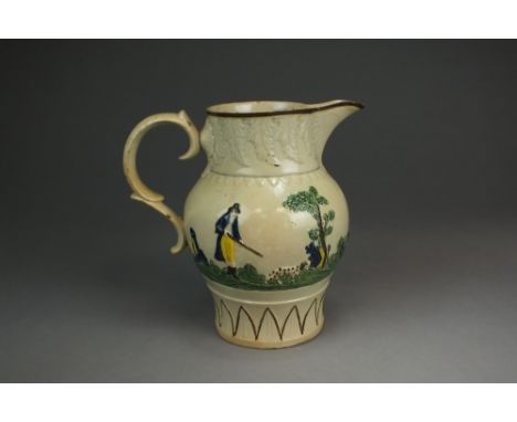 An English prattware Hunting jug,early 19th century, decorated in polychrome relief with figures bird-shooting, with hounds, 