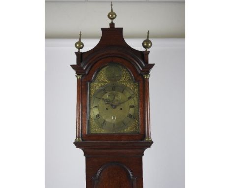 A late 18th-century oak 8-day longcase clock by Hedge of Colchester, the hood with pagoda top is surmounted by three ball and