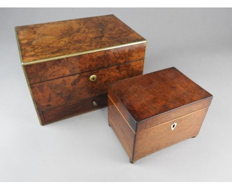A Victorian figured walnut vanity case, second half 19th century with brass bound edges and enclosing a blue leather division