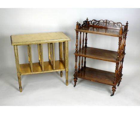 A Victorian walnut three tier what-not, each rectangular shelf spaced by turned pilasters and with foliate pierced top border