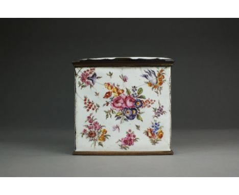 A rare Battersea or Bilston enamel rectangular caddy, 18th century,decorated in polychrome with naturalistic flowers and inse