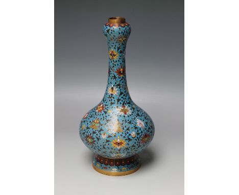 A CHINESE CLOISSONE VASE, the onion body with a floral scrolling pattern on a blue ground, decorated with fish and shells, be