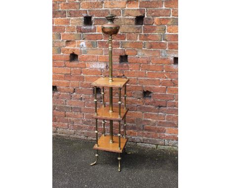 AN UNUSUAL LATE 19TH/EARLY 20TH CENTURY MAHOGANY AND BRASS LAMP STANDARD, having three mahogany tiers supported by brass colu