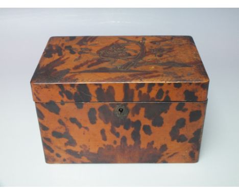 A 19TH CENTURY TWO DIVISION TORTOISESHELL TEA CADDY, of rectangular form, with raised and gilded decoration to hinged lid - h