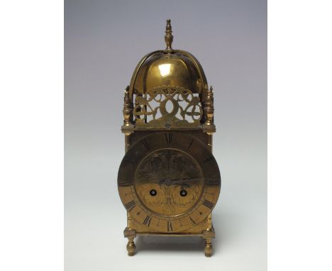 A 20TH CENTURY BRASS LANTERN CLOCK WITH BELL STRIKE, the engraved dial with Roman numerals, with French platform movement sta