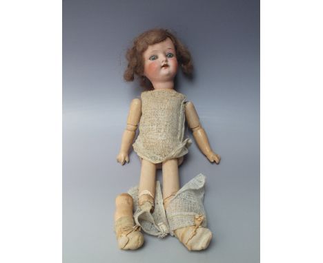 A HEUBACH KOPPELSDORF BISQUE HEADED DOLL, sleeping eyes, open mouth with teeth, wooden jointed limbs, L 35 cm, A/F
