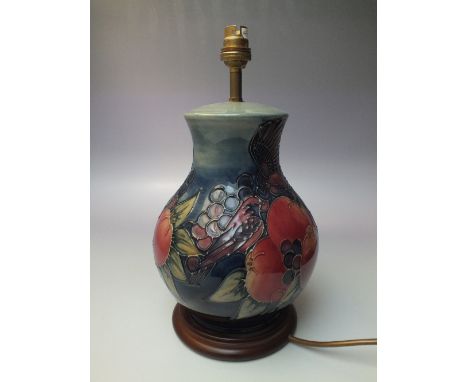 A LARGE MOORCROFT 'BLUE FINCHES' TABLE LAMP, blue ground, tubelined decoration, no visible backstamp, overall H 34 cm (to inc