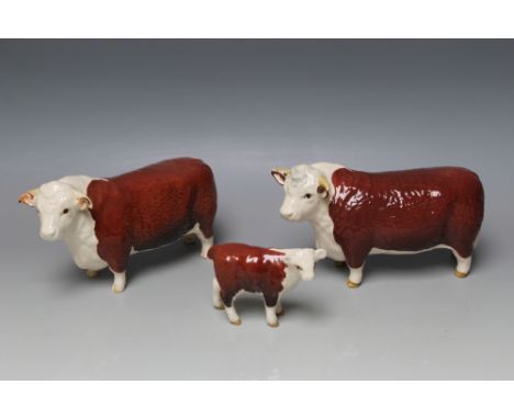 A BESWICK HEREFORD CATTLE TRIO, the first version bull No 1363A, another bull No 1363B and the calf No 1827C, designed by Art