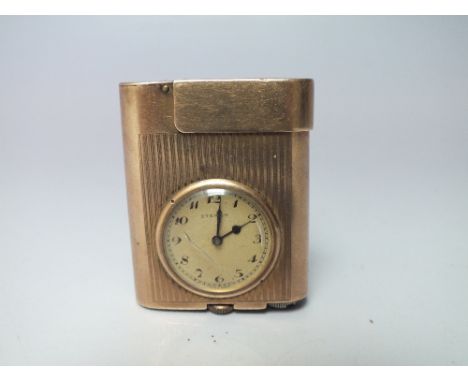 AN UNUSUAL VINTAGE BREVET LIGHTER WITH INSET ETERNA WATCH, the lighter being marked with both makers to the base, also marked