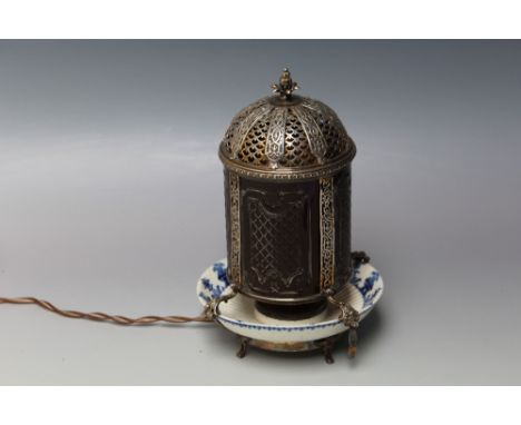 A MOST UNUSUAL LAMP BY BOIN TABURET - PARIS, having a white metal intricately pierced domed lid tops an etched glass shade wh