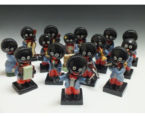 A COLLECTION OF LARGE CARLTON WARE LIMITED EDITION GOLLY BAND FIGURES, comprising Golly Bongo 62 / 100, Piano Player 85 / 125