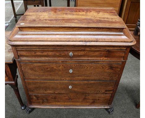 A French oak four drawer chest with caddy top and paw feet, 94cm by 50cm by 100cm